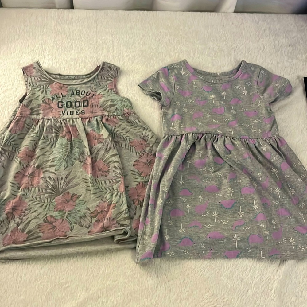 Two‎ size 4t gray patterned dresses both a polyester blend